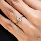 Close up of marquise center stone with brilliant cut facets