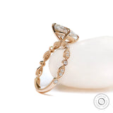 Detail of round accent stones on yellow gold band