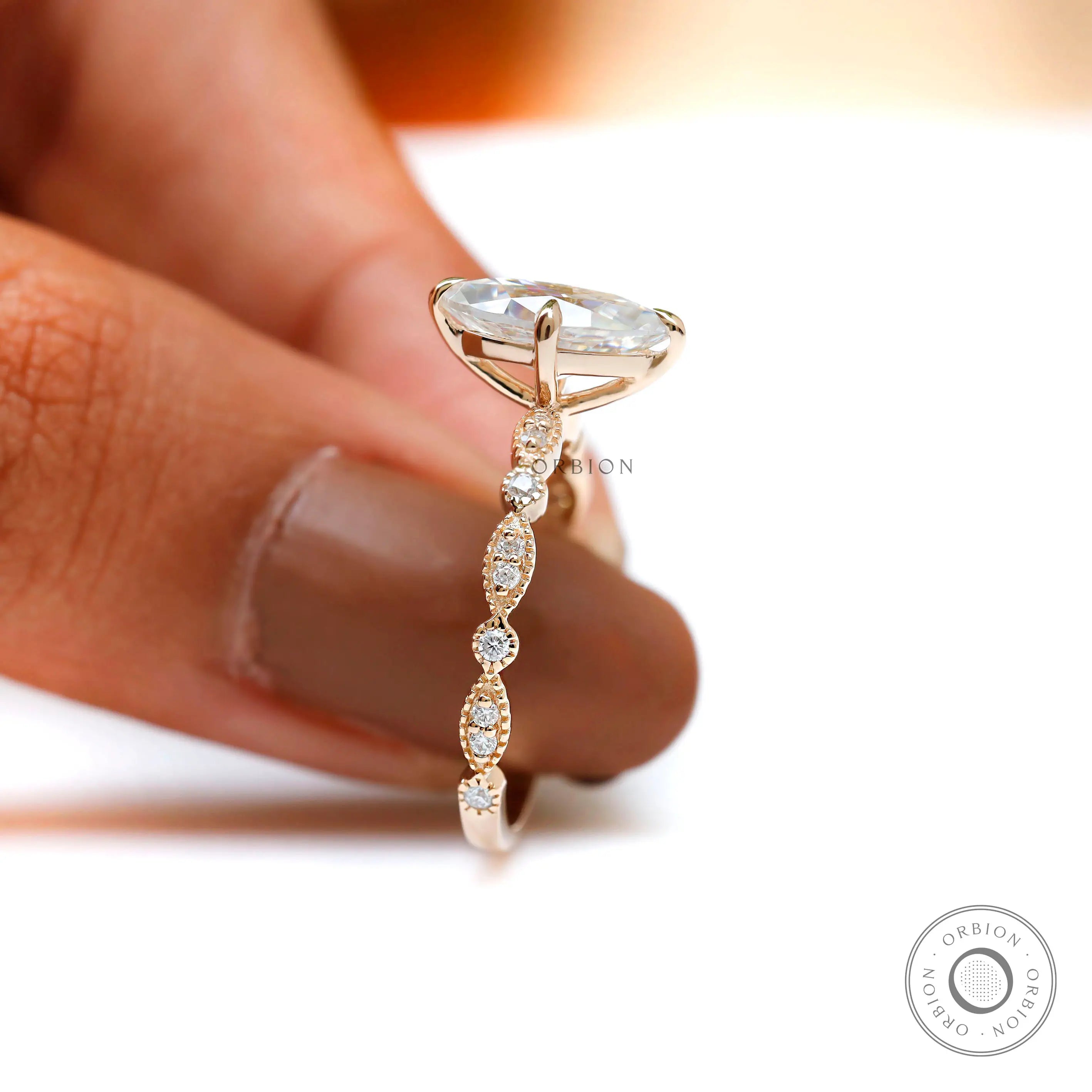 Marquise solitaire ring with vintage inspired accent band