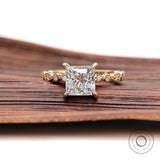 Vintage style princess cut moissanite engagement ring in yellow gold