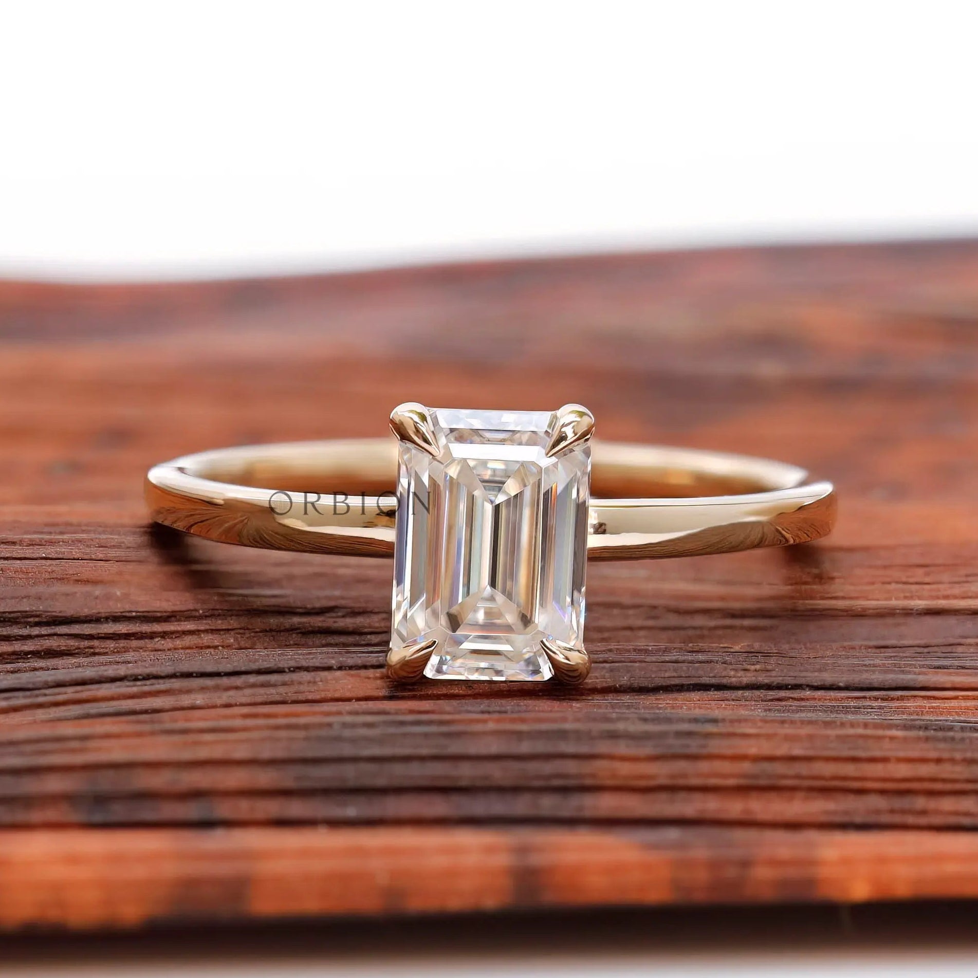 Emerald shape lab diamond solitaire ring top view