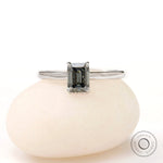 Front view emerald cut grey moissanite solitaire ring white gold