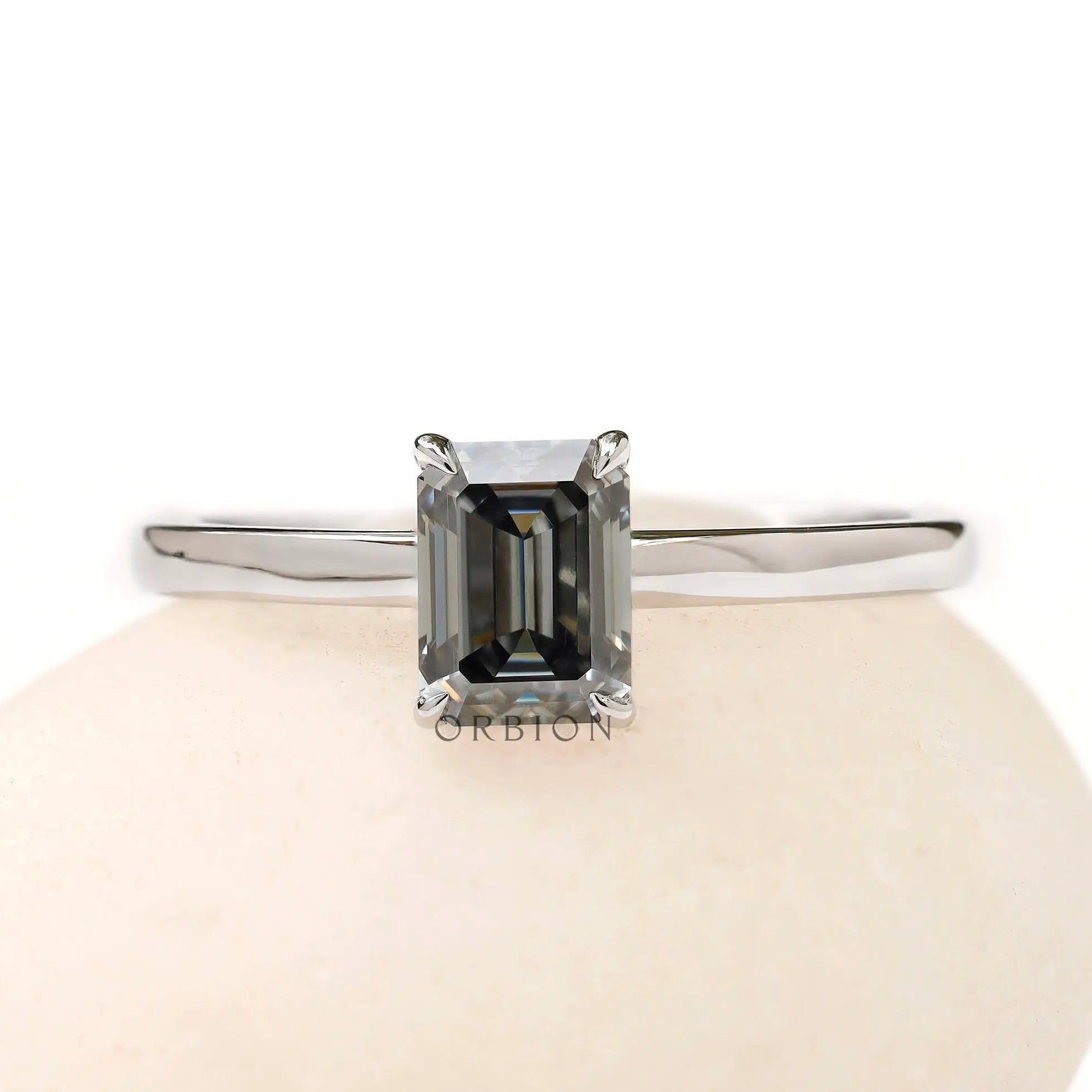Front view emerald cut grey moissanite solitaire ring white gold