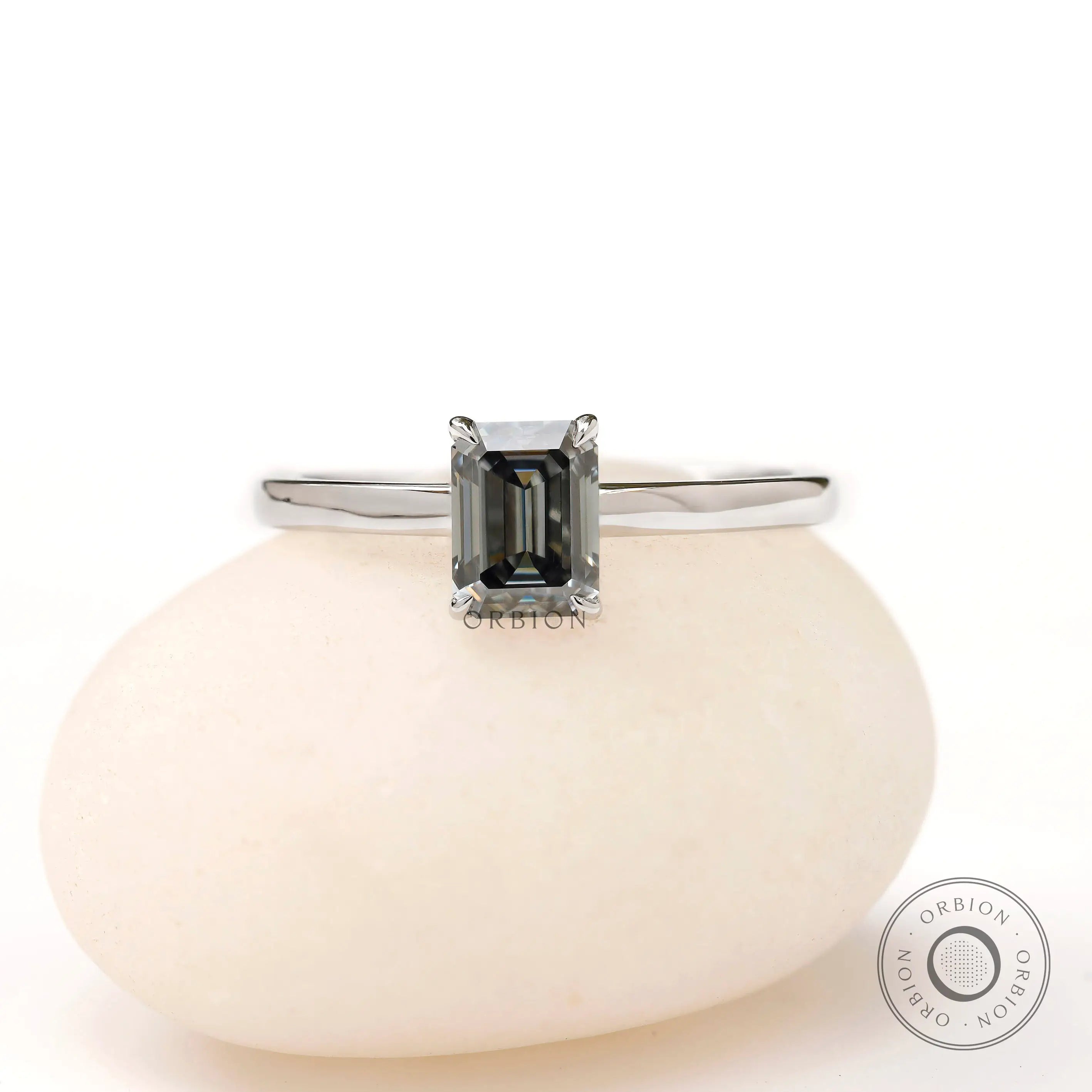 Front view emerald cut grey moissanite solitaire ring white gold