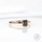 Yellow gold emerald cut engagement ring minimal style