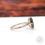 Side profile showing slim tapered solitaire band