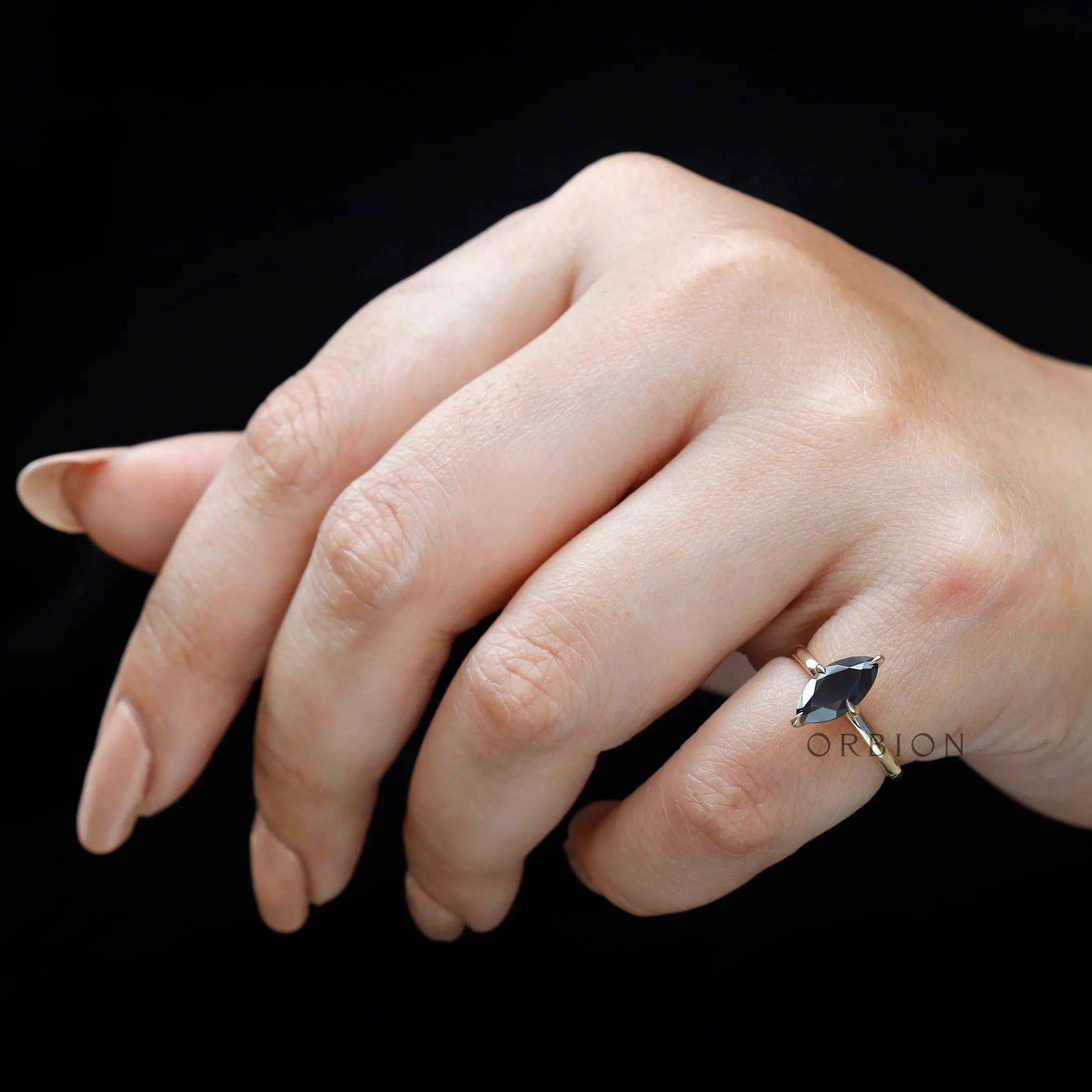 On-hand view showing marquise ring proportions