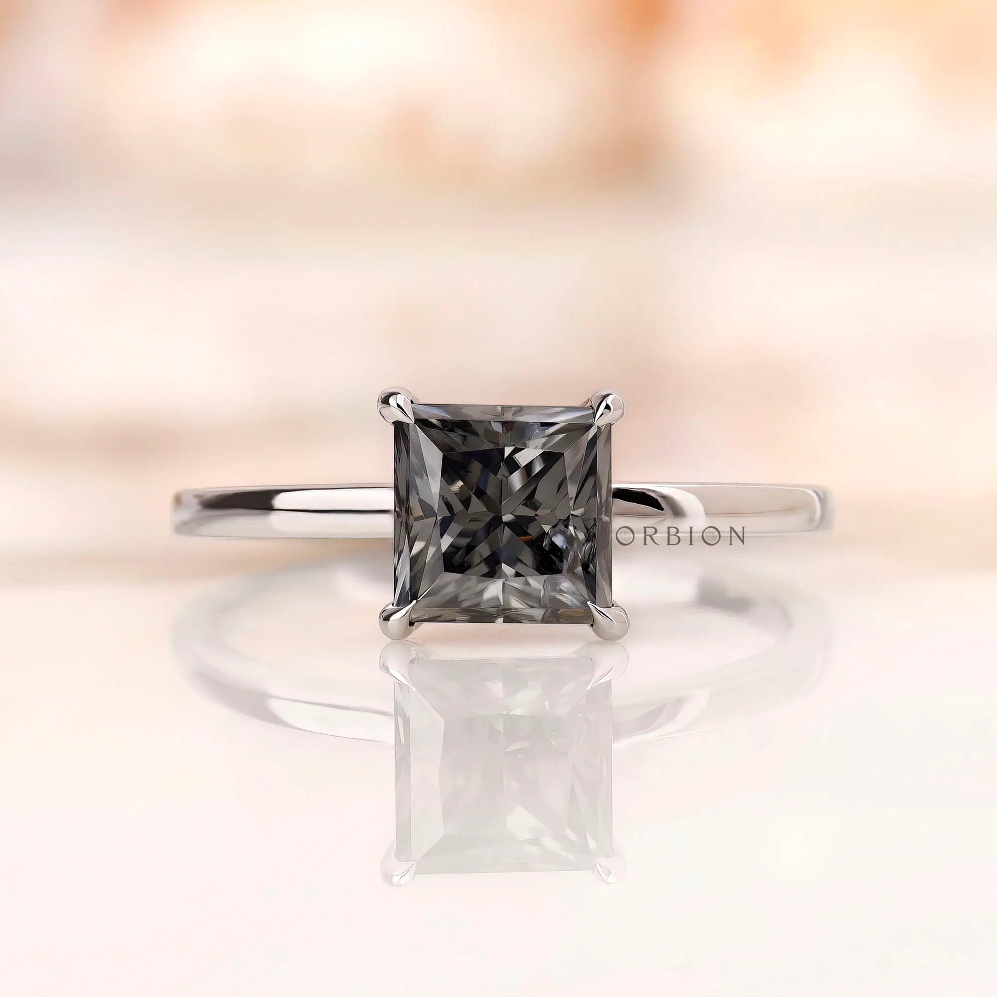Grey princess cut moissanite solitaire ring in 14K white gold top view