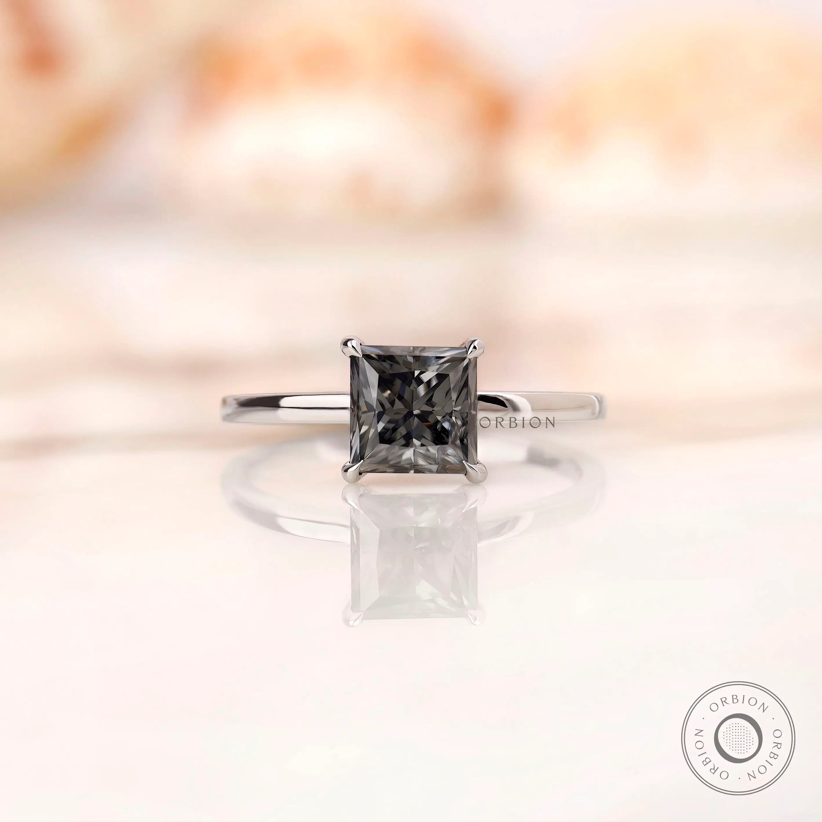 Grey princess cut moissanite solitaire ring in 14K white gold top view