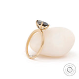 Martini setting detail of black moissanite solitaire ring