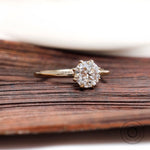 Rear view of yellow gold solitaire ring with elevated basket