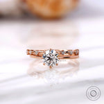 Cathedral style round lab grown diamond engagement ring in 14K rose gold