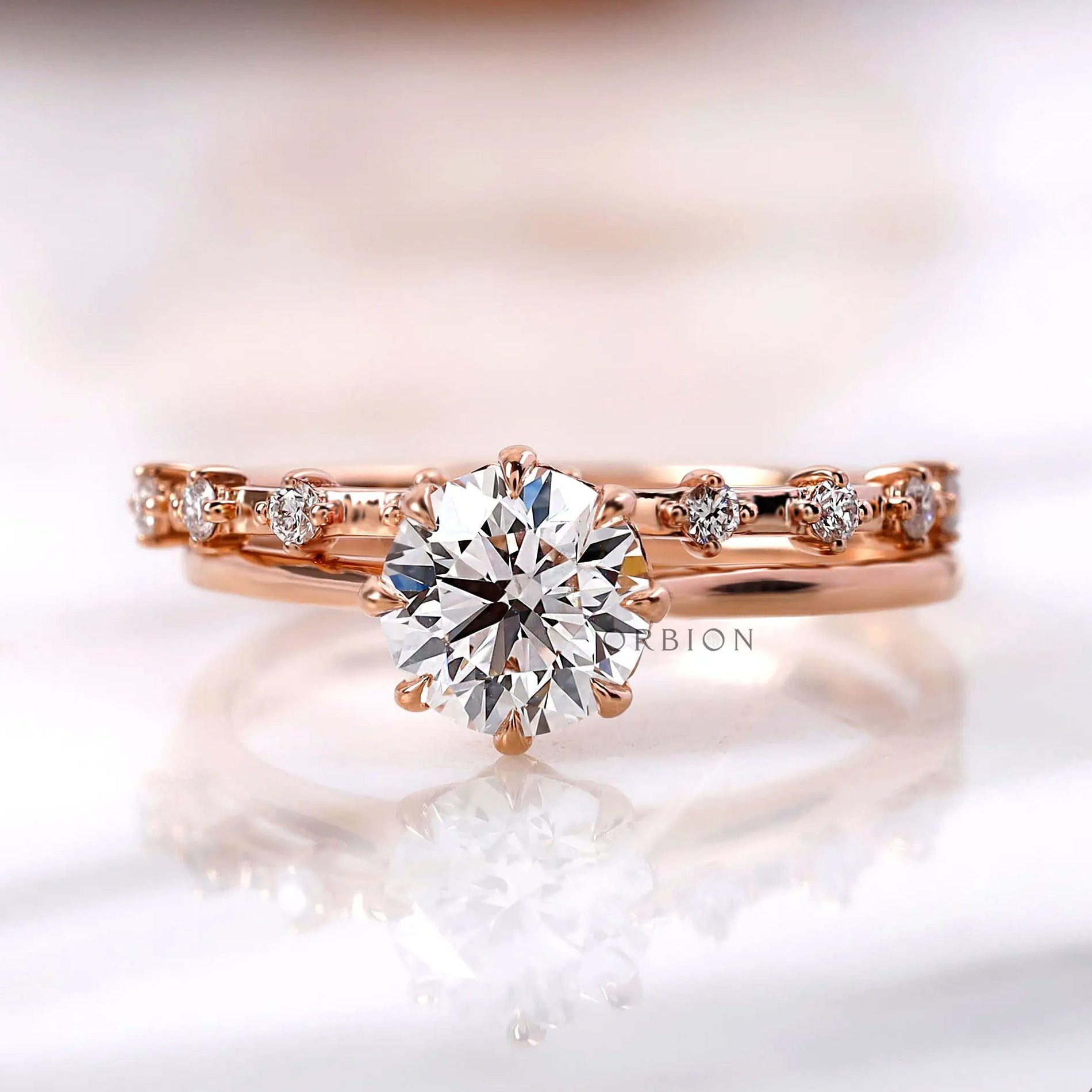Cathedral style round lab grown diamond engagement ring in 14K rose gold