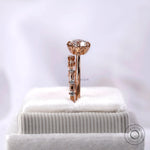 Cathedral style engagement ring with accent diamonds