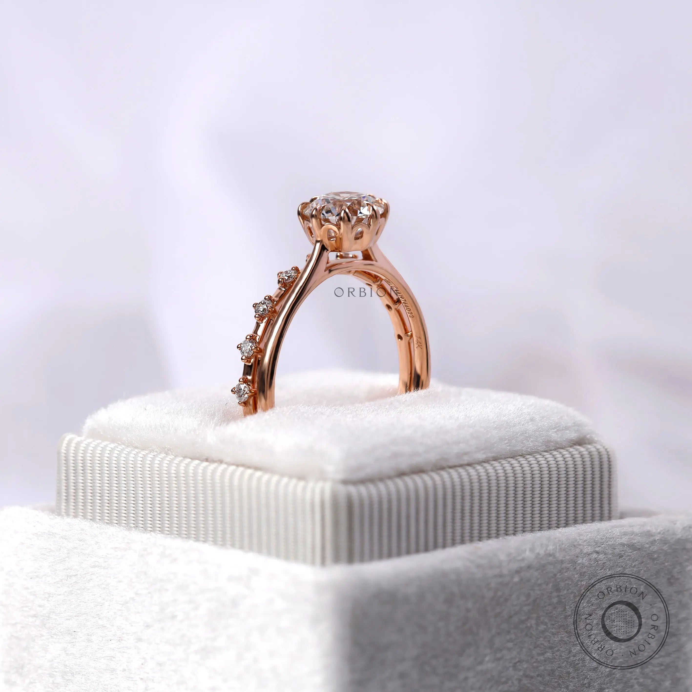 Diamond accent band detail on cathedral engagement ring