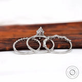 White gold bridal ring set with marquise and round diamonds