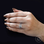 On-hand view of marquise diamond bridal set