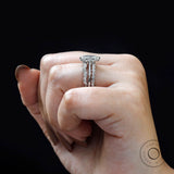 Close-up of marquise center diamond with accent stones