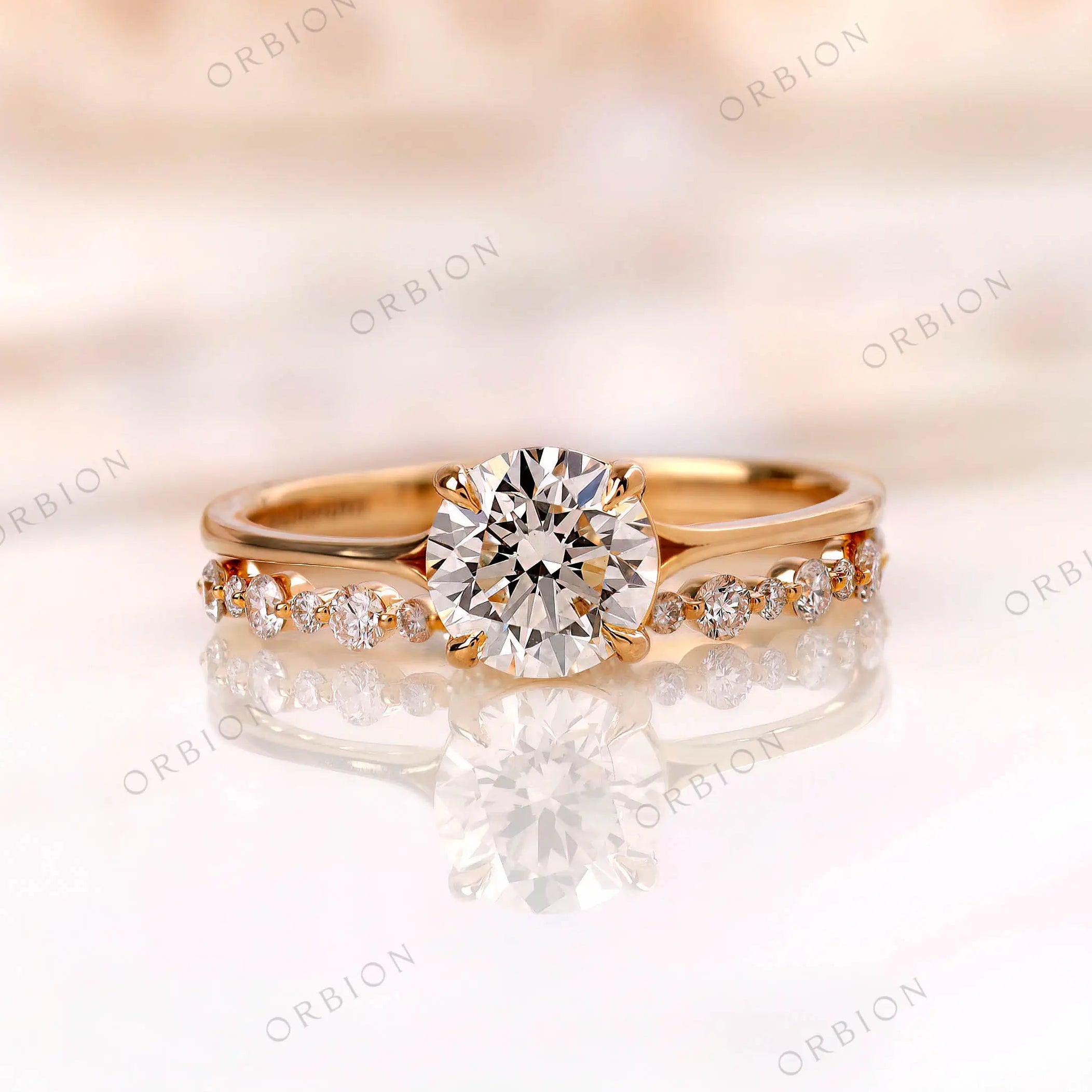 Round cut lab grown diamond engagement ring with diamond band in 14K yellow gold front view