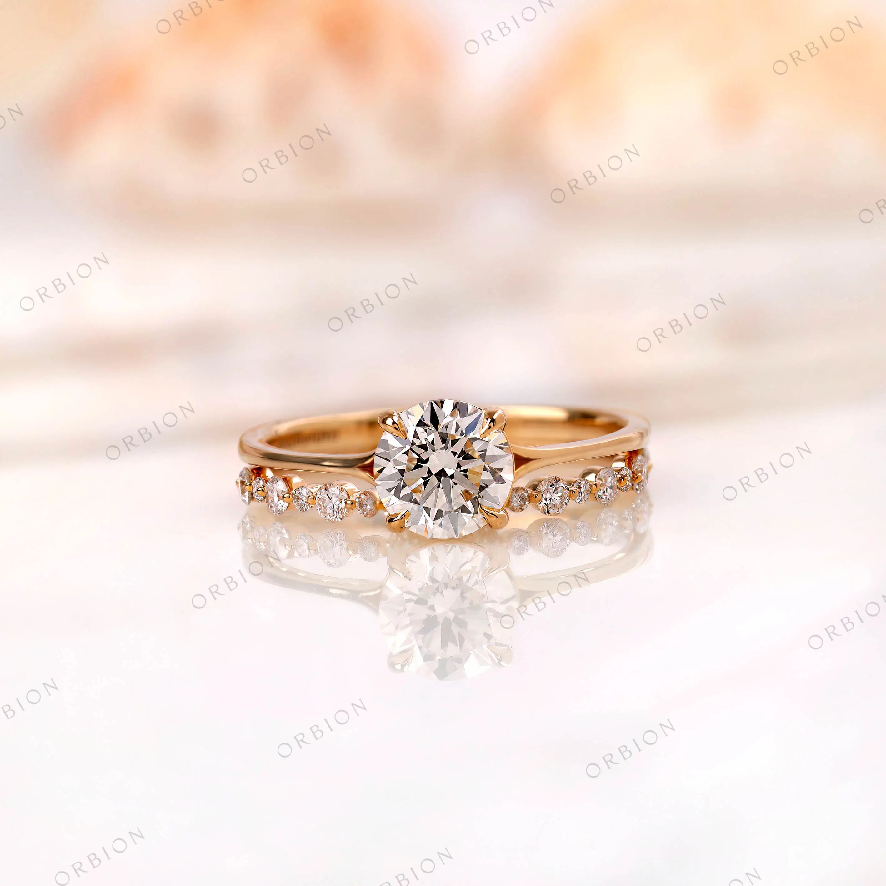 Round cut lab grown diamond engagement ring with diamond band in 14K yellow gold front view