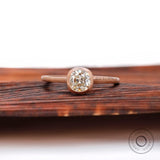 Minimal cushion solitaire ring top view