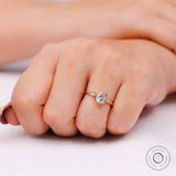 Yellow gold solitaire ring showing slim polished band