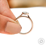 Angled side view highlighting cathedral structure and bezel setting