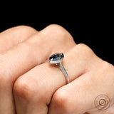 Grey moissanite brilliant cut bezel setting angle view