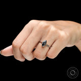 Marquise cut grey moissanite bezel ring on fingure