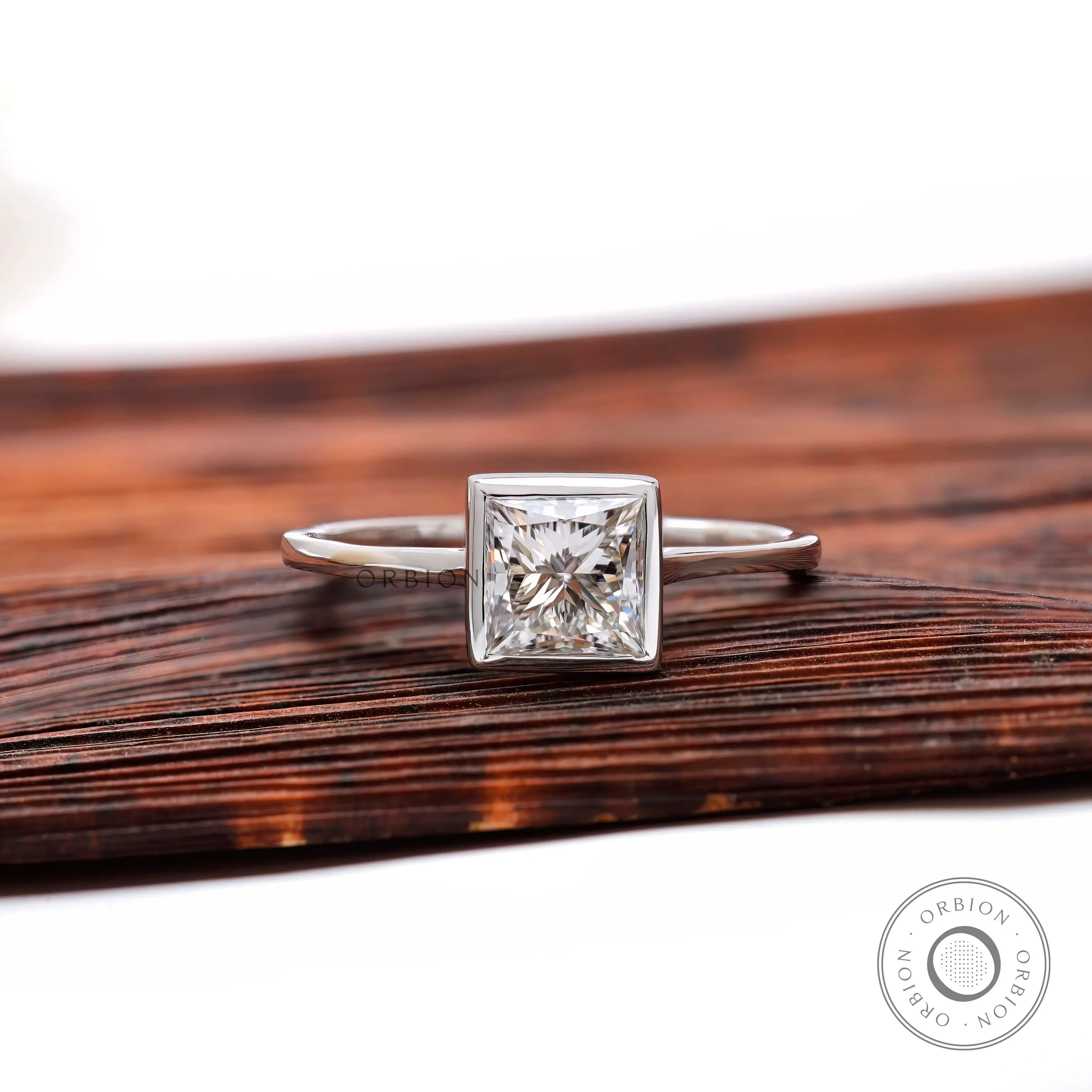 Princess cut lab grown diamond bezel solitaire ring in 14K white gold front view