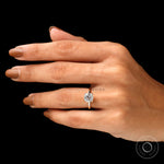 Cushion cut center stone solitaire ring on fingure