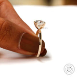 Yellow gold shank cushion solitaire ring, side angle view