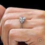 Close up of oval center stone with marquise side stones
