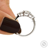 White gold floral engagement ring with oval center stone