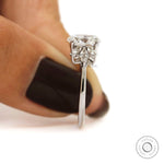 Elegant oval cut floral engagement ring design