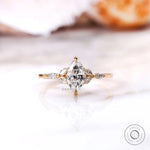 Marquise lab grown diamond cluster engagement ring in 14K yellow gold