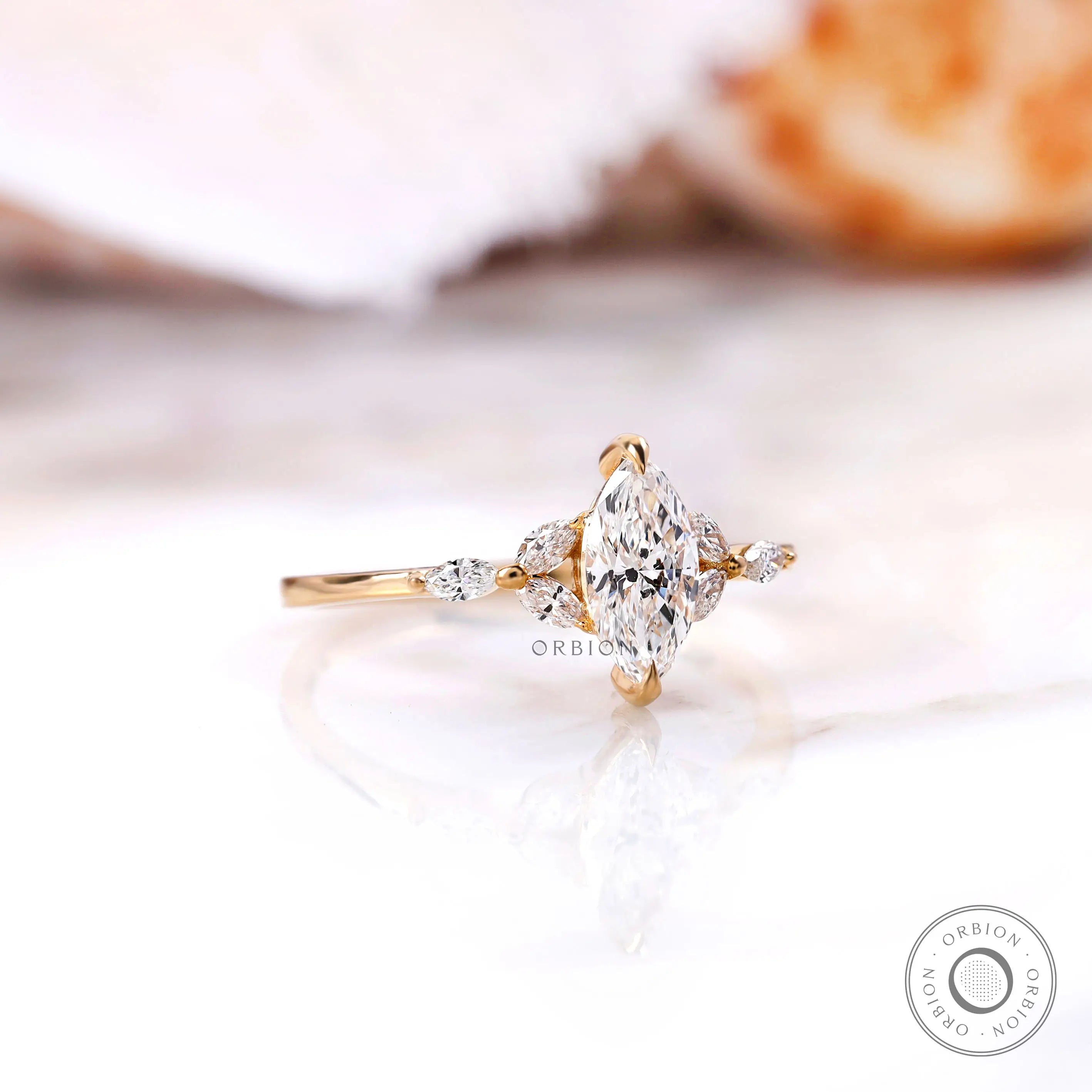 Yellow gold marquise diamond cluster ring side view