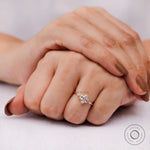 Marquise diamond cluster ring worn on hand