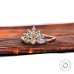 Diamond leaf cluster ring showing marquise stone arrangement