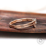 Side view of lab grown diamond halo ring in rose gold
