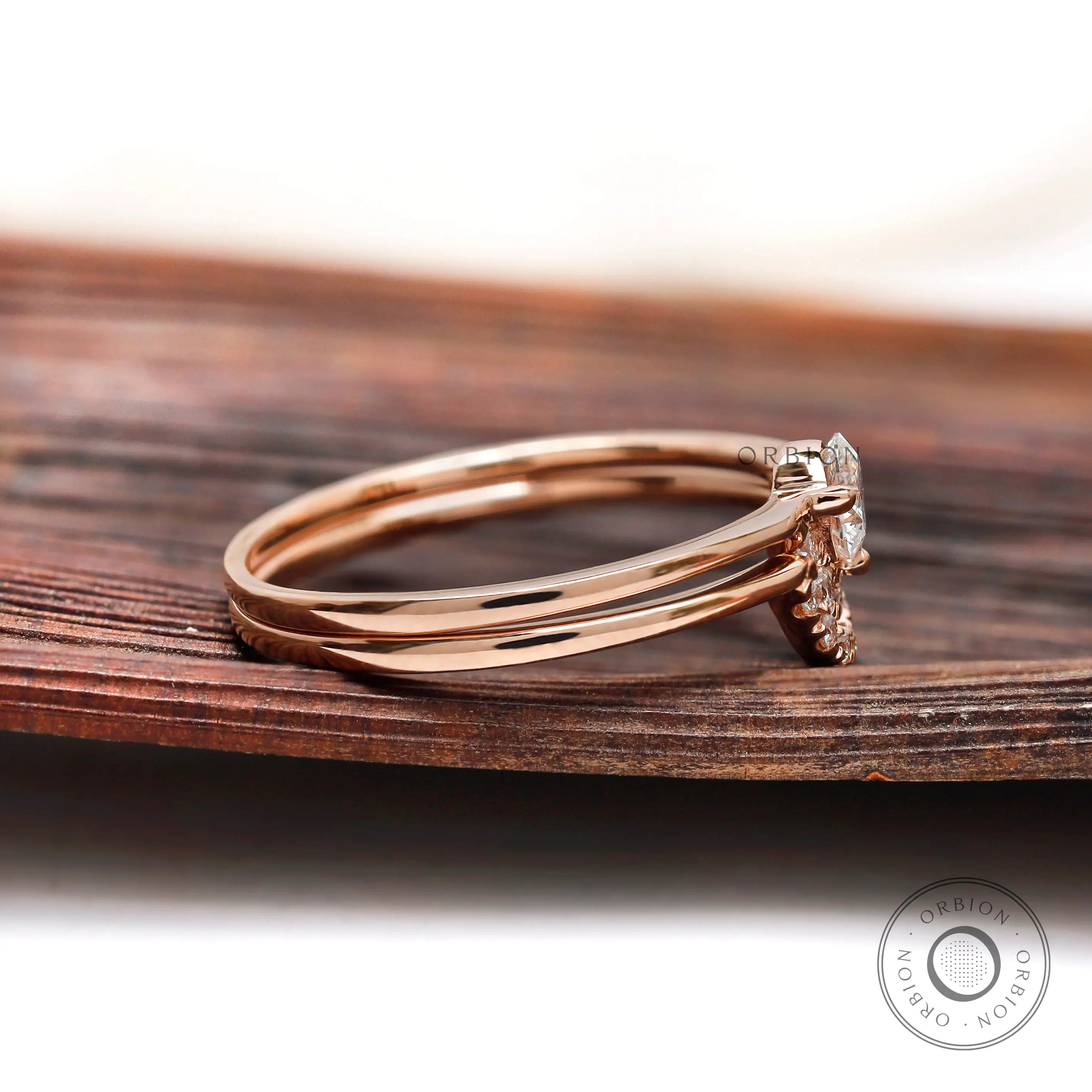 Side view of lab grown diamond halo ring in rose gold