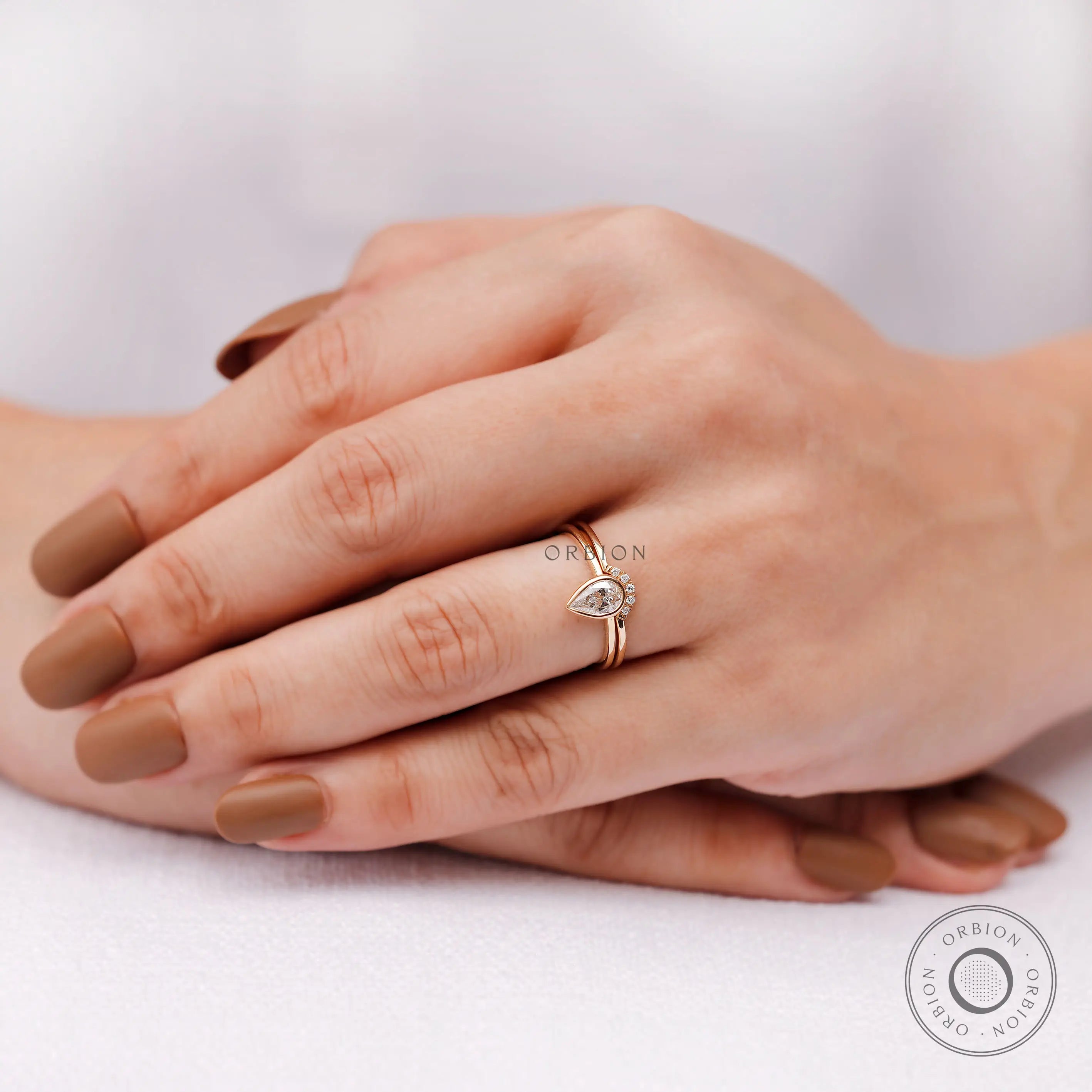 Elegant pear lab grown diamond ring set lifestyle image