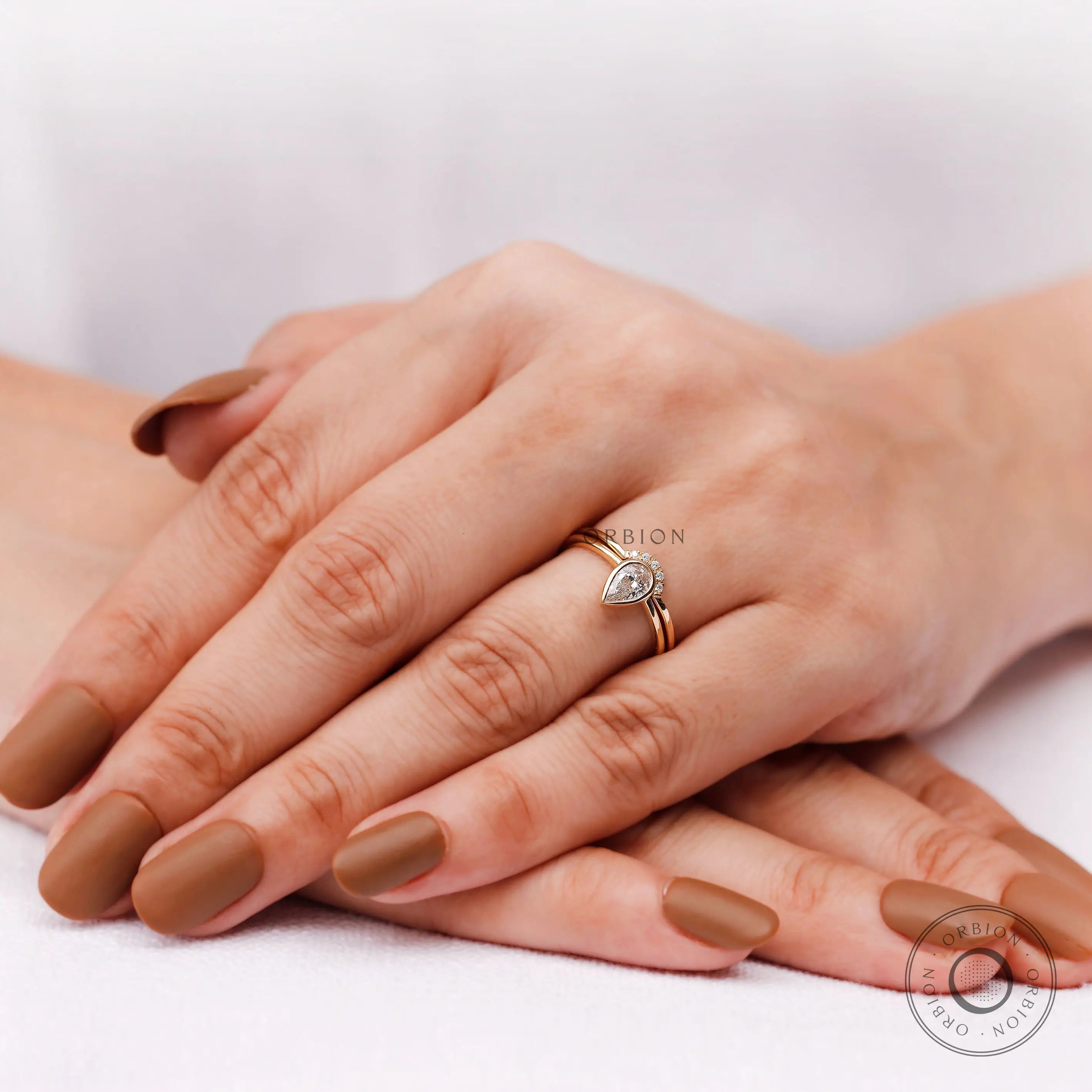 Minimal yellow gold pear diamond ring set