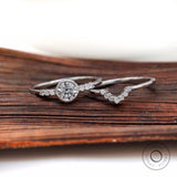 Matching contoured band with round diamond engagement ring