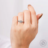 Round lab grown diamond engagement ring worn on hand