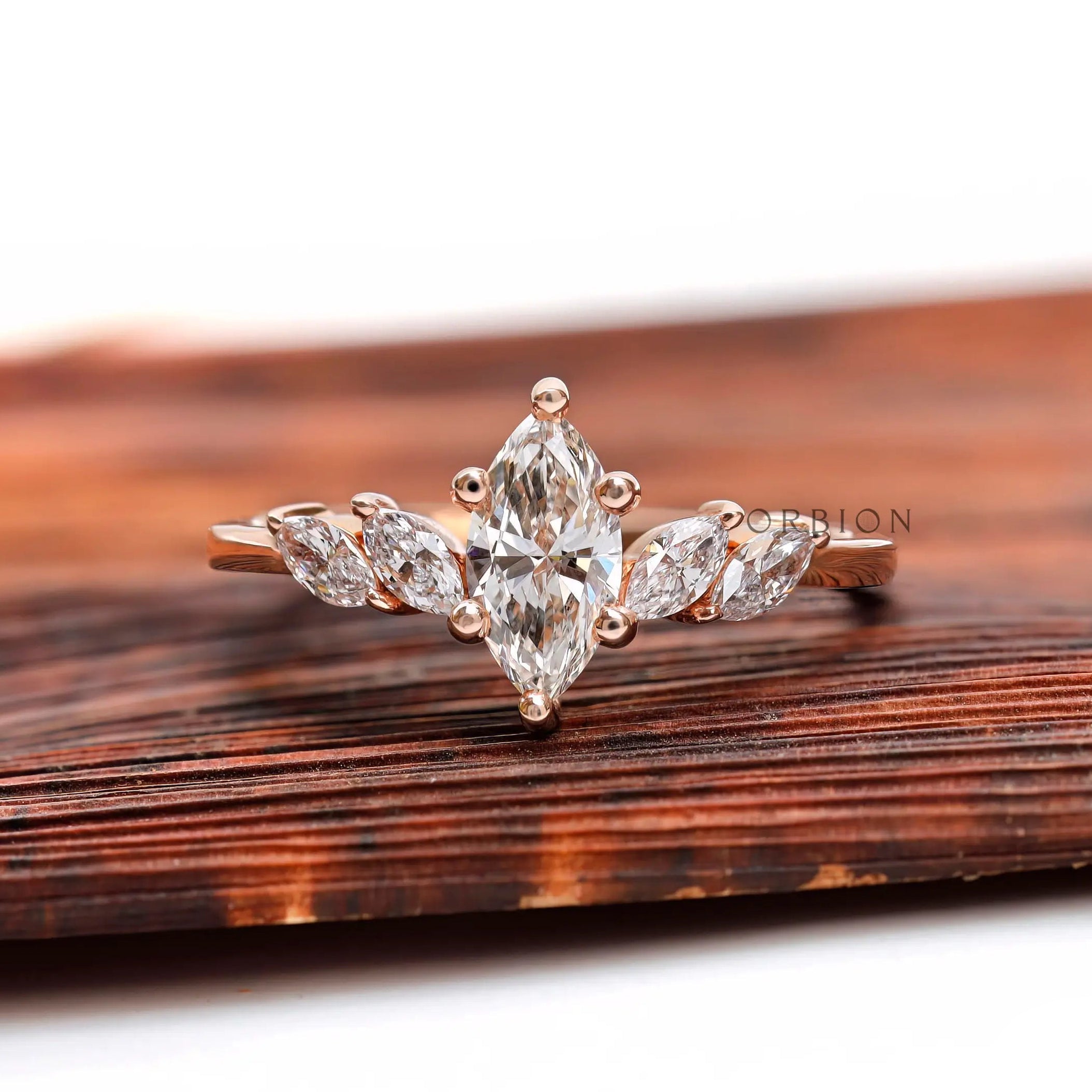 Marquise lab grown diamond cluster engagement ring in 14K rose gold