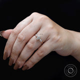 Marquise diamond cluster ring worn on hand