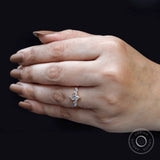 Delicate rose gold marquise cluster ring lifestyle image