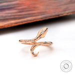 Diamond snake ring in 14K rose gold with open bypass design