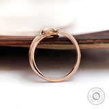 Open snake ring in high polish rose gold side view